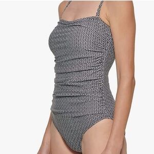 NWT. New women’s size small DKNY swimsuit with removable or adjustable straps